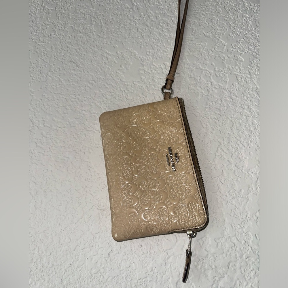 Coach Beige Embossed Wristlet